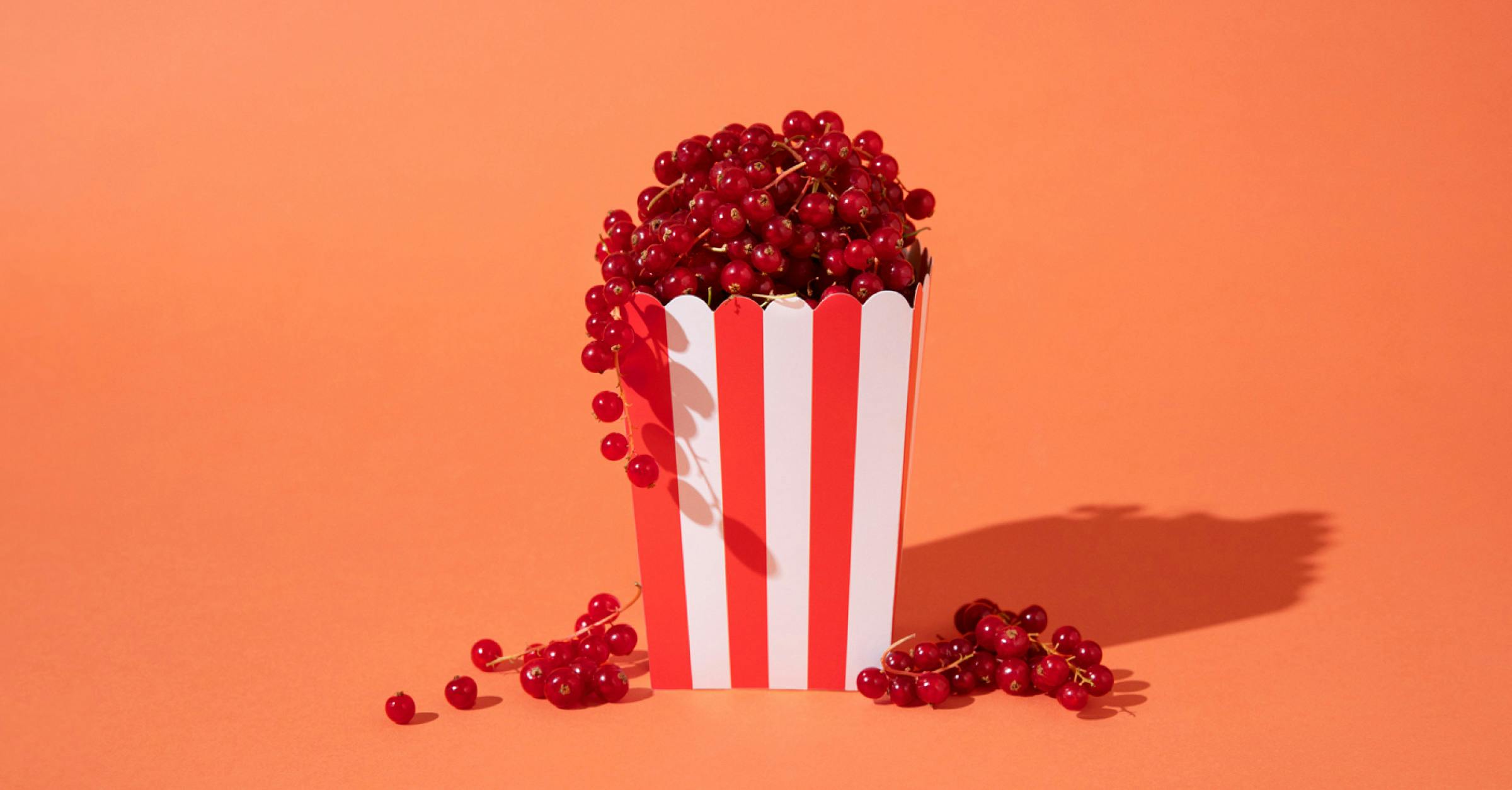 Box of popcorn filled with berries